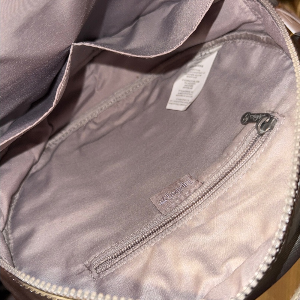 •KIPLINGS•NWT “RANI” METALLIC PEWTER ROUND CIRCULAR BOOKBAG - Picture 11 of 15
